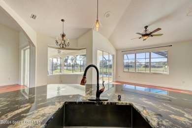 This exquisite waterfront home w/ gas heated; saltwater pool on Savannahs Golf Club in Florida - for sale on GolfHomes.com, golf home, golf lot