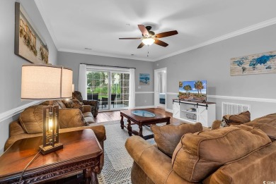 This furnished 3-bedroom, 2-bath condo offers beach living at on Myrtlewood Golf Course and Club  in South Carolina - for sale on GolfHomes.com, golf home, golf lot
