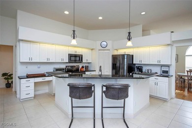 This impeccably maintained traditional style home sits on a on Beachview Golf Club in Florida - for sale on GolfHomes.com, golf home, golf lot