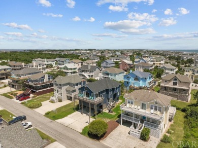 Discover your perfect beachside getaway in this beautifully on The Currituck Golf Club in North Carolina - for sale on GolfHomes.com, golf home, golf lot