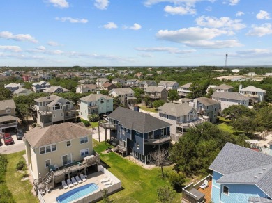 Discover your perfect beachside getaway in this beautifully on The Currituck Golf Club in North Carolina - for sale on GolfHomes.com, golf home, golf lot