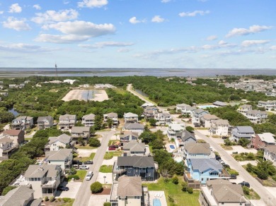 Discover your perfect beachside getaway in this beautifully on The Currituck Golf Club in North Carolina - for sale on GolfHomes.com, golf home, golf lot