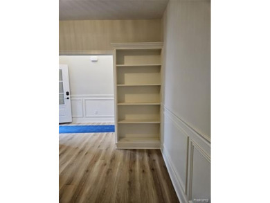 Ready to move in - includes the irrigation system, sod, and on St Clair River Country Club in Michigan - for sale on GolfHomes.com, golf home, golf lot