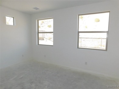 This is the Ironwood Plan featuring 2 bedrooms and office nook on Laughlin Ranch Golf Club in Arizona - for sale on GolfHomes.com, golf home, golf lot