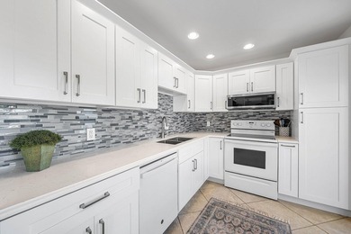 Beautifully updated 2-bedroom, 2-bath second-floor residence in on Quail Ridge Golf Course and Country Club in Florida - for sale on GolfHomes.com, golf home, golf lot