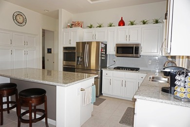 This Stunning Golf Course Emerald Model Is Perfectly Positioned on Mountain Vista Golf Course At Sun City Palm Desert in California - for sale on GolfHomes.com, golf home, golf lot