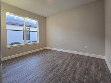 MOTIVATED Seller! Like New MAGARI MODEL HOME on a Beautiful on Stonegate Golf Club in Florida - for sale on GolfHomes.com, golf home, golf lot