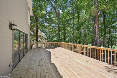Welcome to this beautifully renovated 5-bedroom, 3.5-bathroom on Brookstone Golf and Country Club in Georgia - for sale on GolfHomes.com, golf home, golf lot