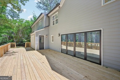 Welcome to this beautifully renovated 5-bedroom, 3.5-bathroom on Brookstone Golf and Country Club in Georgia - for sale on GolfHomes.com, golf home, golf lot