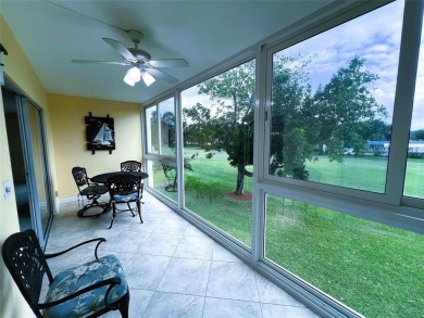 2nd FLOOR CORNER with WIDE GOLF/LAKE/POOL VIEW Plus HURRICANE on Wynmoor Golf Course in Florida - for sale on GolfHomes.com, golf home, golf lot