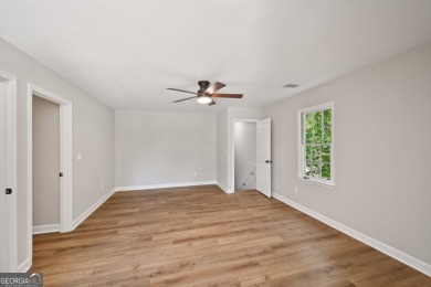 Welcome to this beautifully renovated 5-bedroom, 3.5-bathroom on Brookstone Golf and Country Club in Georgia - for sale on GolfHomes.com, golf home, golf lot