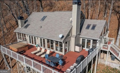 THAT VIEW . . . This perfect mountain cabin sits at over 3000 on Big Canoe Golf Club - Cherokee in Georgia - for sale on GolfHomes.com, golf home, golf lot