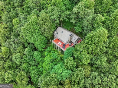 THAT VIEW . . . This perfect mountain cabin sits at over 3000 on Big Canoe Golf Club - Cherokee in Georgia - for sale on GolfHomes.com, golf home, golf lot