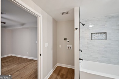 Welcome to this beautifully renovated 5-bedroom, 3.5-bathroom on Brookstone Golf and Country Club in Georgia - for sale on GolfHomes.com, golf home, golf lot