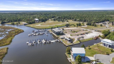 Waterfront Home in Diamondhead!This beautifully crafted on Diamondhead Country Club in Mississippi - for sale on GolfHomes.com, golf home, golf lot