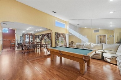 Discover One Of The Premier Locations In Woodmont, Nestled on Woodmont Country Club in Florida - for sale on GolfHomes.com, golf home, golf lot