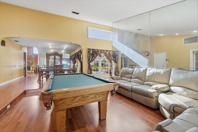 Discover One Of The Premier Locations In Woodmont, Nestled on Woodmont Country Club in Florida - for sale on GolfHomes.com, golf home, golf lot