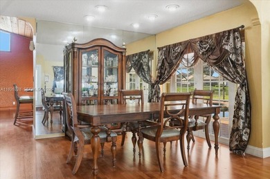 Discover One Of The Premier Locations In Woodmont, Nestled on Woodmont Country Club in Florida - for sale on GolfHomes.com, golf home, golf lot