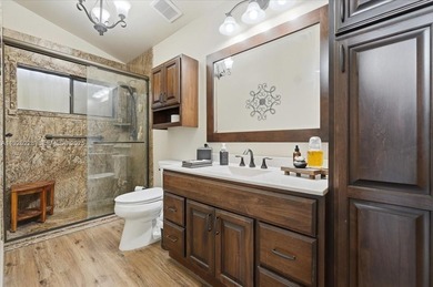 Discover One Of The Premier Locations In Woodmont, Nestled on Woodmont Country Club in Florida - for sale on GolfHomes.com, golf home, golf lot