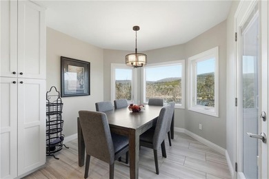 Elegant, updated 1,976 sq ft home offering sweeping views of on Holiday Island Executive Golf Course in Arkansas - for sale on GolfHomes.com, golf home, golf lot