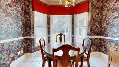 Imagine mornings on your spacious covered front porch or on Okefenokee Country Club in Georgia - for sale on GolfHomes.com, golf home, golf lot