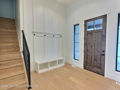 Refined Elegance Joins Nature's Doorstep. Set within one of the on Teton Reserve in Idaho - for sale on GolfHomes.com, golf home, golf lot