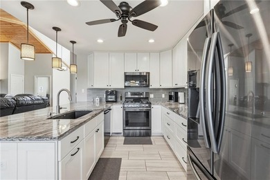 Elegant, updated 1,976 sq ft home offering sweeping views of on Holiday Island Executive Golf Course in Arkansas - for sale on GolfHomes.com, golf home, golf lot