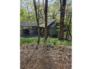 Nestled near the end of a serene Cul de sac, this beautiful on Big Canoe Golf Club - Cherokee in Georgia - for sale on GolfHomes.com, golf home, golf lot