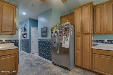 Welcome to 307 Okmulgee Circle, a beautifully maintained walkout on Tanasi Golf Course in Tennessee - for sale on GolfHomes.com, golf home, golf lot