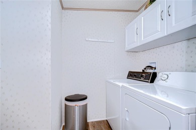Immaculately maintained Palm Harbor home in picturesque Betmar on Betmar Acres Golf Club in Florida - for sale on GolfHomes.com, golf home, golf lot