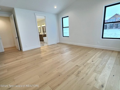 Refined Elegance Joins Nature's Doorstep. Set within one of the on Teton Reserve in Idaho - for sale on GolfHomes.com, golf home, golf lot