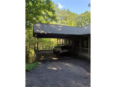 Nestled near the end of a serene Cul de sac, this beautiful on Big Canoe Golf Club - Cherokee in Georgia - for sale on GolfHomes.com, golf home, golf lot