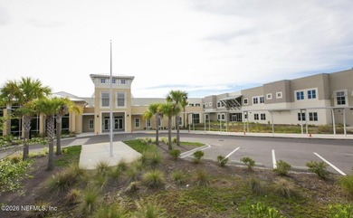 The POND view of this ground-floor condo will WOW you! Only two on The Palencia Club in Florida - for sale on GolfHomes.com, golf home, golf lot