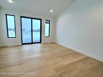 Refined Elegance Joins Nature's Doorstep. Set within one of the on Teton Reserve in Idaho - for sale on GolfHomes.com, golf home, golf lot