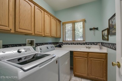 Welcome to 307 Okmulgee Circle, a beautifully maintained walkout on Tanasi Golf Course in Tennessee - for sale on GolfHomes.com, golf home, golf lot