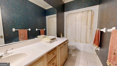 Imagine mornings on your spacious covered front porch or on Okefenokee Country Club in Georgia - for sale on GolfHomes.com, golf home, golf lot