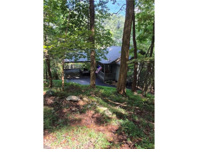 Nestled near the end of a serene Cul de sac, this beautiful on Big Canoe Golf Club - Cherokee in Georgia - for sale on GolfHomes.com, golf home, golf lot