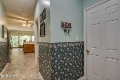 Welcome to 307 Okmulgee Circle, a beautifully maintained walkout on Tanasi Golf Course in Tennessee - for sale on GolfHomes.com, golf home, golf lot