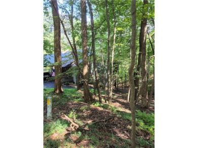 Nestled near the end of a serene Cul de sac, this beautiful on Big Canoe Golf Club - Cherokee in Georgia - for sale on GolfHomes.com, golf home, golf lot