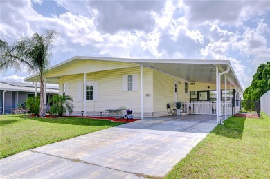 Immaculately maintained Palm Harbor home in picturesque Betmar on Betmar Acres Golf Club in Florida - for sale on GolfHomes.com, golf home, golf lot