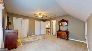 Imagine mornings on your spacious covered front porch or on Okefenokee Country Club in Georgia - for sale on GolfHomes.com, golf home, golf lot