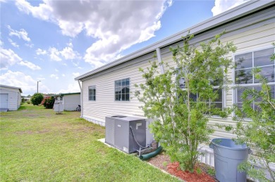 Immaculately maintained Palm Harbor home in picturesque Betmar on Betmar Acres Golf Club in Florida - for sale on GolfHomes.com, golf home, golf lot