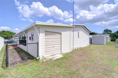 Immaculately maintained Palm Harbor home in picturesque Betmar on Betmar Acres Golf Club in Florida - for sale on GolfHomes.com, golf home, golf lot