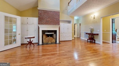 Imagine mornings on your spacious covered front porch or on Okefenokee Country Club in Georgia - for sale on GolfHomes.com, golf home, golf lot