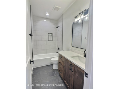 Refined Elegance Joins Nature's Doorstep. Set within one of the on Teton Reserve in Idaho - for sale on GolfHomes.com, golf home, golf lot