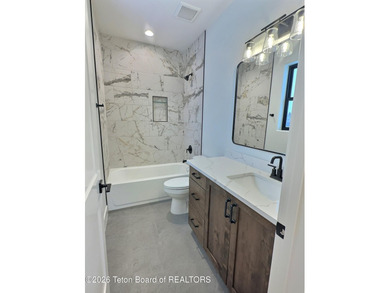 Refined Elegance Joins Nature's Doorstep. Set within one of the on Teton Reserve in Idaho - for sale on GolfHomes.com, golf home, golf lot