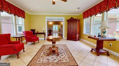 Imagine mornings on your spacious covered front porch or on Okefenokee Country Club in Georgia - for sale on GolfHomes.com, golf home, golf lot