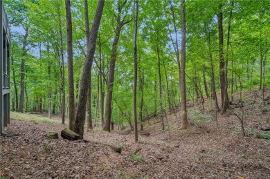Nestled near the end of a serene Cul de sac, this beautiful on Big Canoe Golf Club - Cherokee in Georgia - for sale on GolfHomes.com, golf home, golf lot