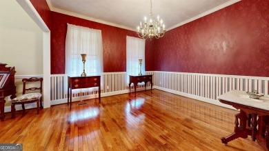 Imagine mornings on your spacious covered front porch or on Okefenokee Country Club in Georgia - for sale on GolfHomes.com, golf home, golf lot