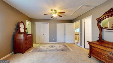 Imagine mornings on your spacious covered front porch or on Okefenokee Country Club in Georgia - for sale on GolfHomes.com, golf home, golf lot